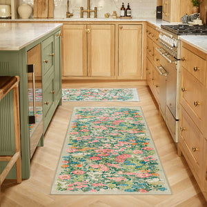 Wallflower Sage Eco-Washable Runner in Green with a floral design, styled in a kitchen.