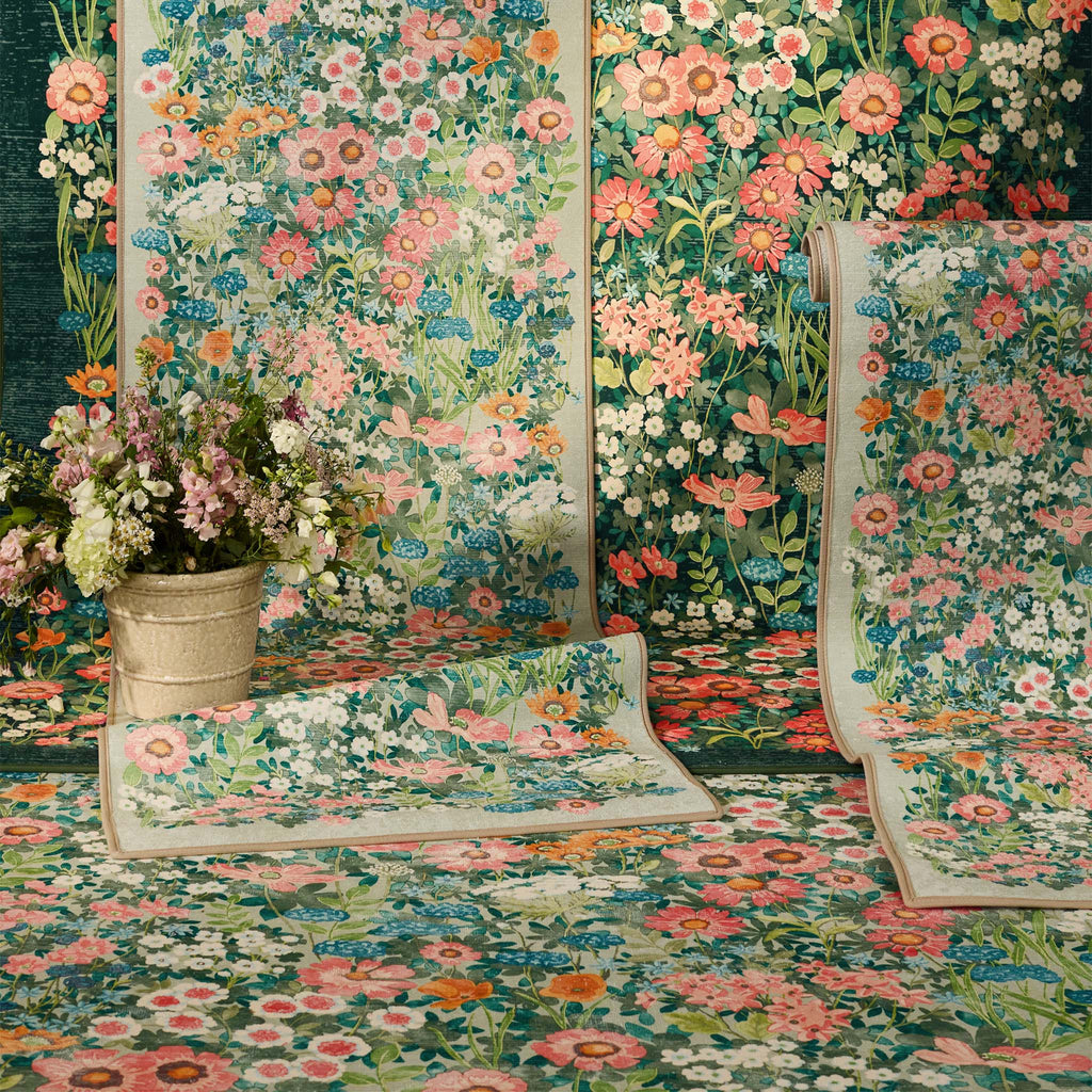 Wallflower Sage Eco-Washbale Rug in Green with a floral design.