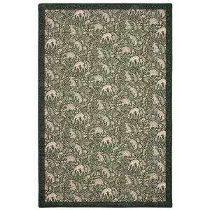 Whimsical Woodland Eco-Washable Rug – a green eco-washable rug featuring white woodland animals and white florals.