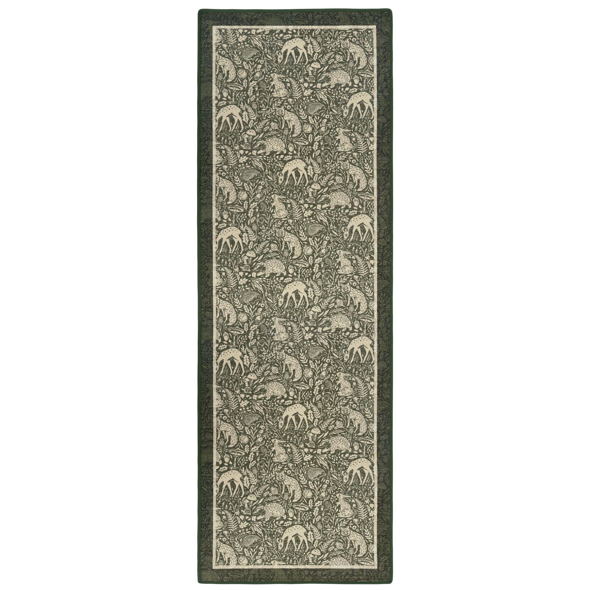 Whimsical Woodland Eco-Washable Runner – a green eco-washable runner featuring white woodland animals and white florals.