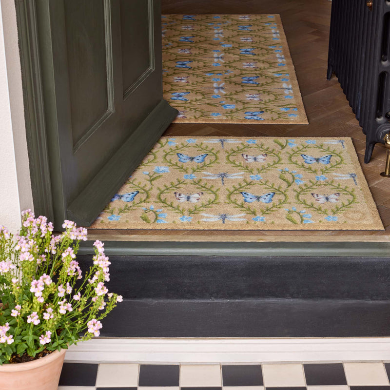 Wild Meadow Beige Green Doormat made from 100% recycled cotton featuring a meadow inspired pattern.