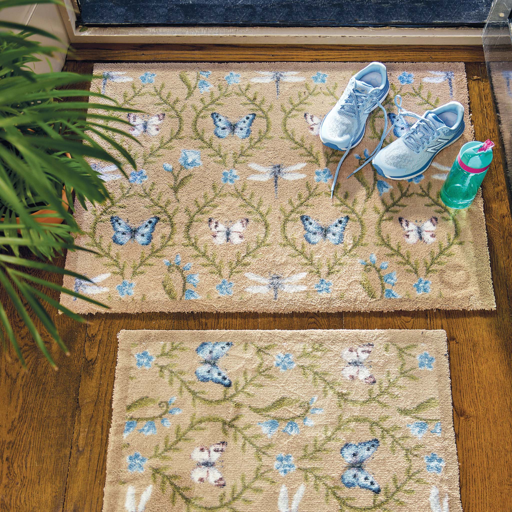 Wild Meadow Beige Green Doormat made from 100% recycled cotton featuring a meadow inspired pattern.