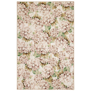 Floral patterned rug with pink hydrangea flowers and green leaves on a beige background