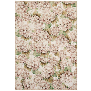 Floral patterned rug with pink hydrangea flowers and green leaves on a beige background