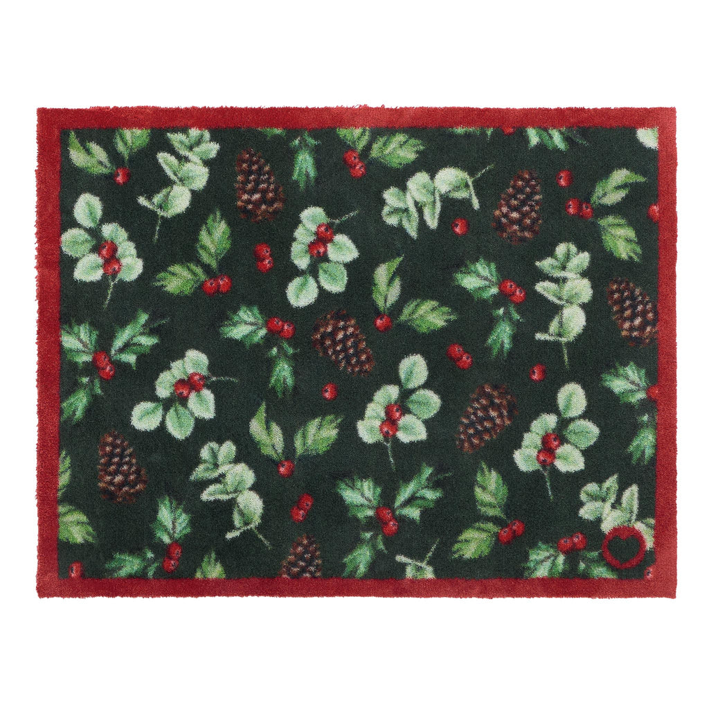Discover the Winter Berries Doormat- a cotton mat featuring pinecones, red berries and holly leaves. 