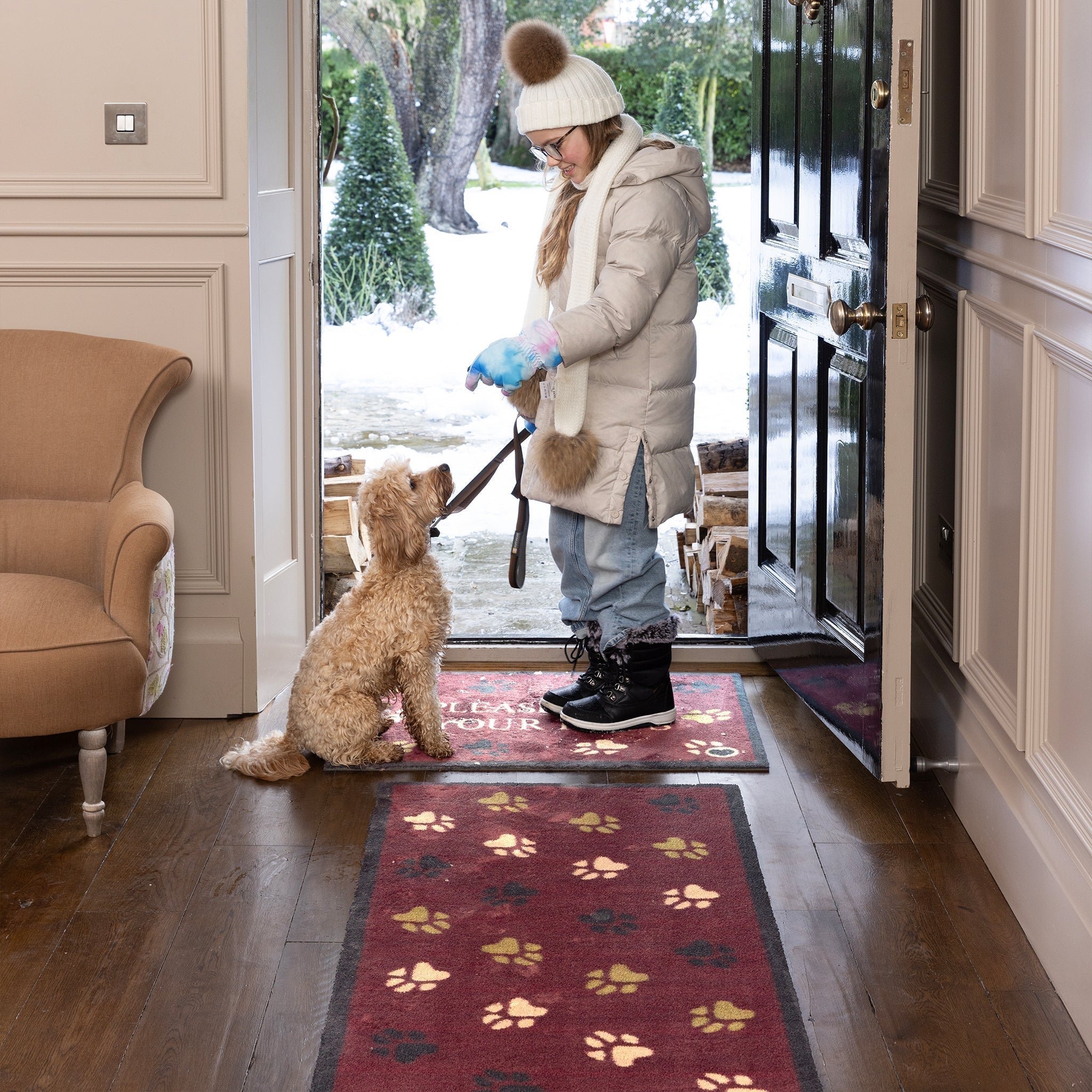  Wipe Your Paws Burgundy Runner in a dark red- a 100% recycled cotton runner featuring scattered paw prints in dark navy, light green, and beige. 