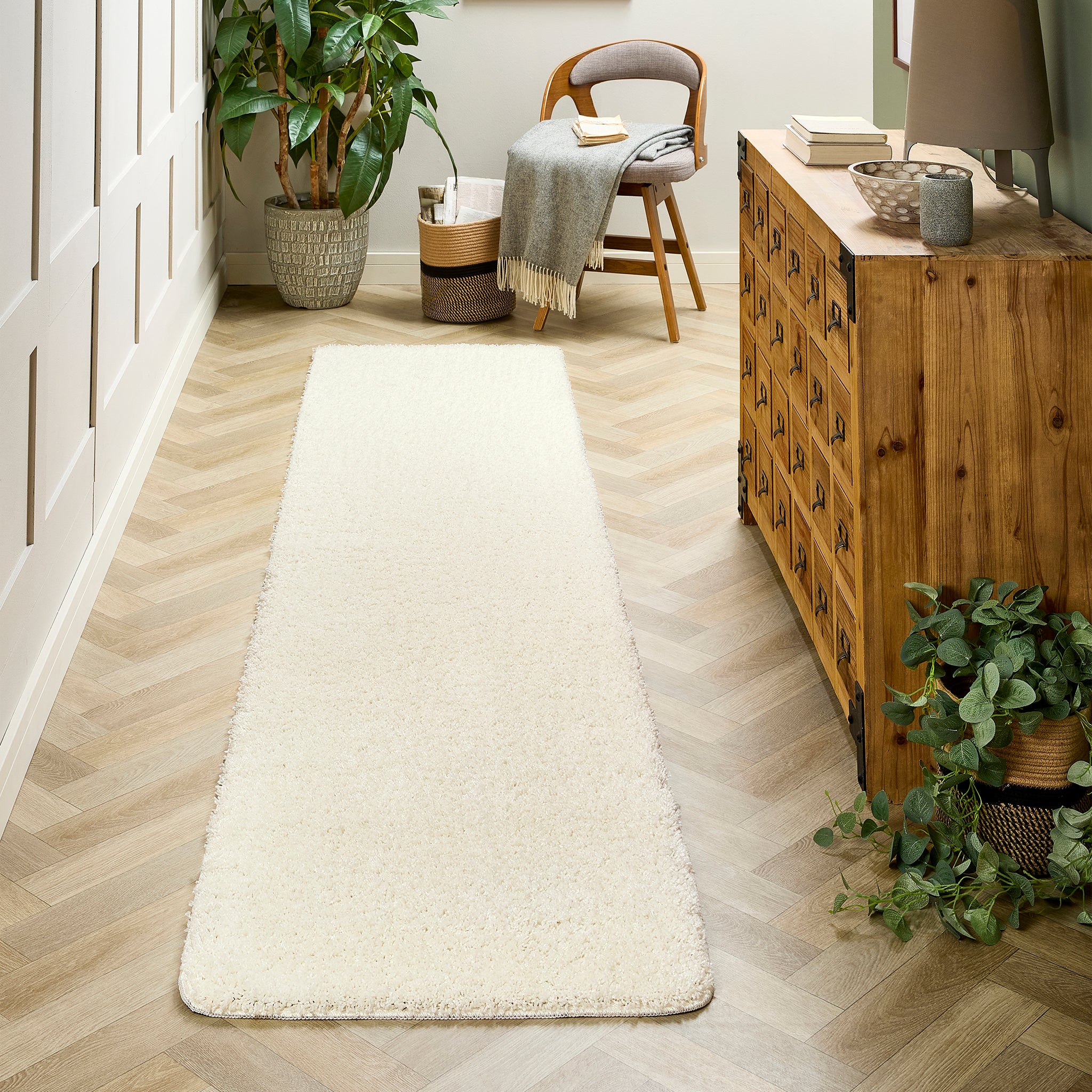My Rug Ivory White Runner with a shaggy pile, styled in a hallway. 