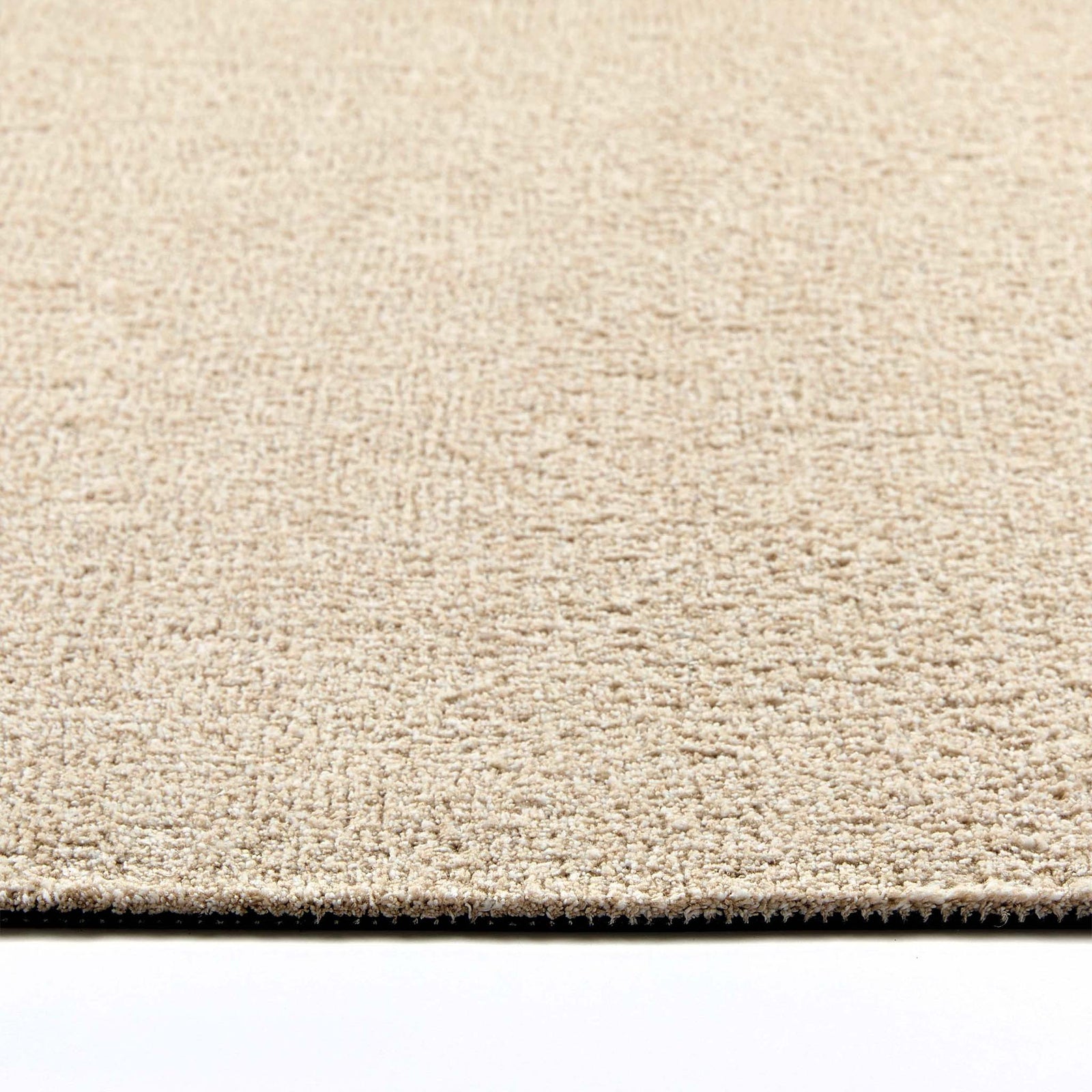 Plain Fleck Beige Washable Runner- a 100% recycled material runner in a solid beige colour.