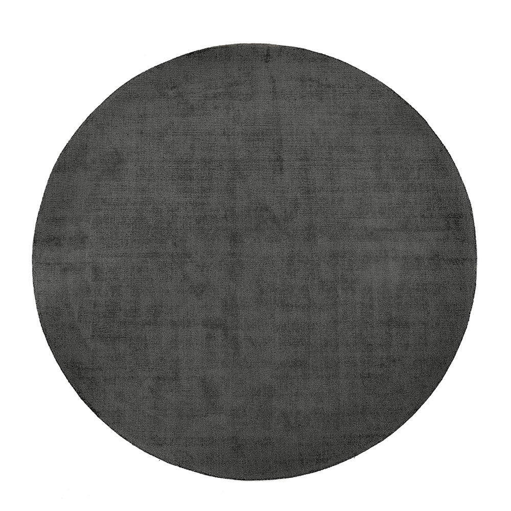 Reef Dark Grey Rug made from 100% recycled materials in a solid dark grey colour. 