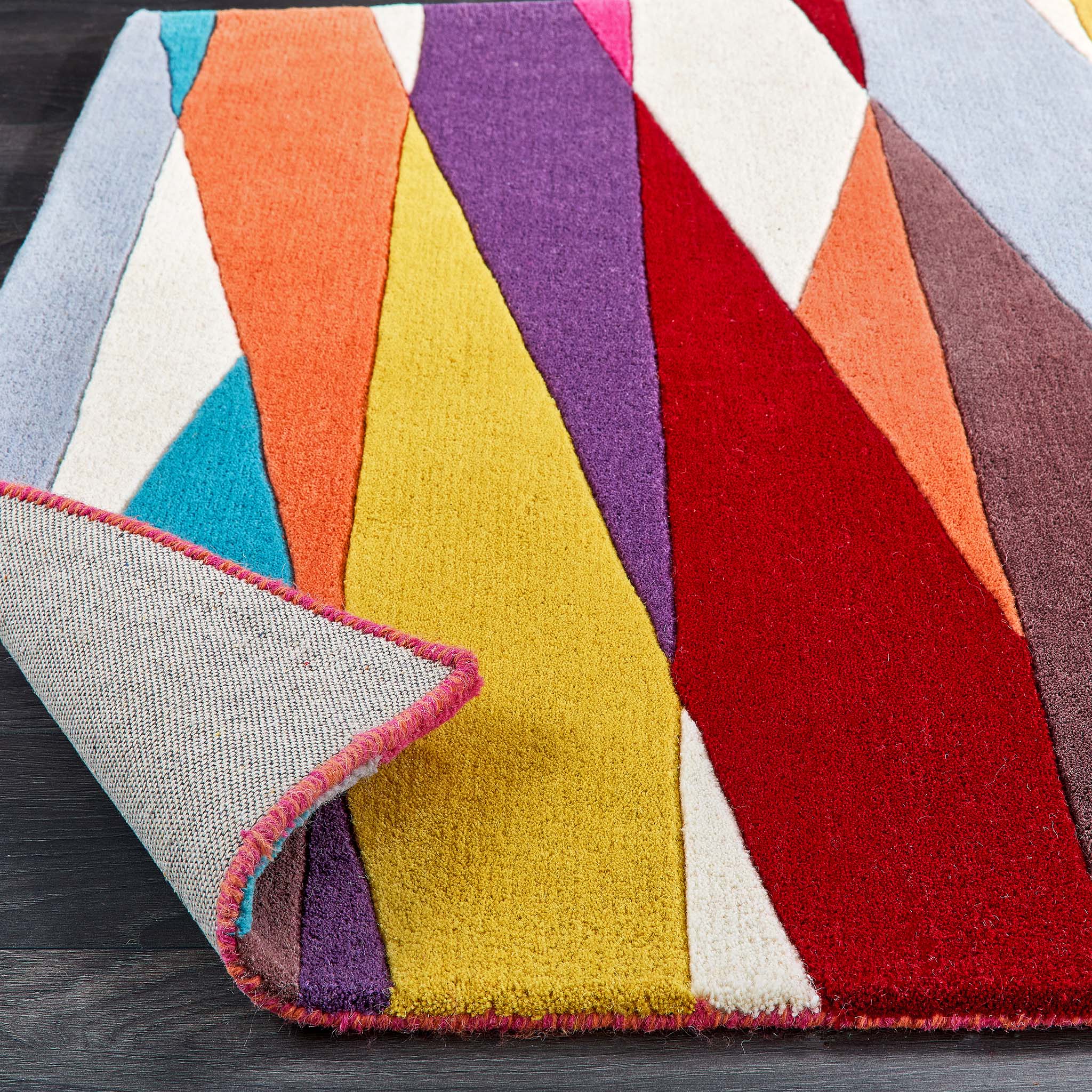 Shard Multi Rug made from 100% wool, featuring a geometric design.  
