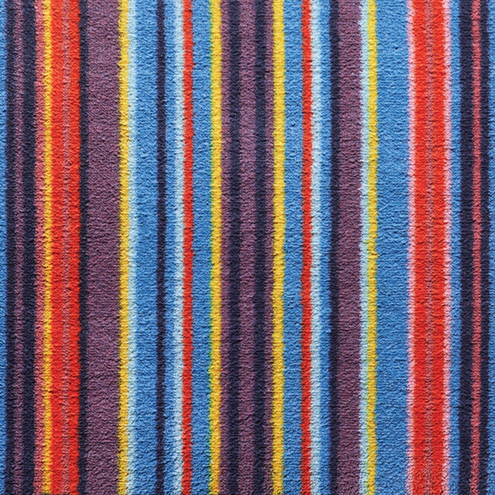 Stripe 85 Multi Washable Runner- a 100% recycled cotton runner featuring a bright striped pattern.