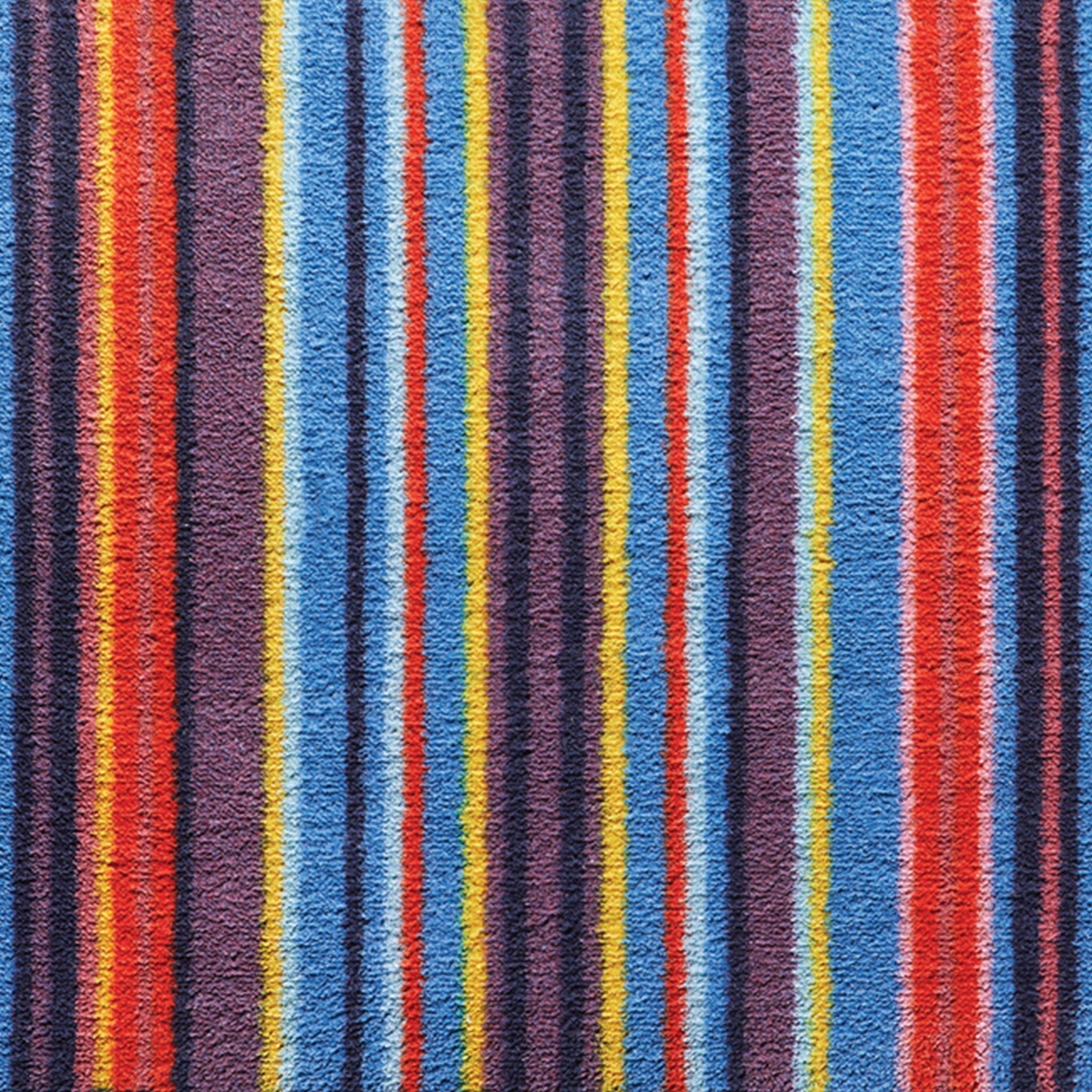 Stripe 85 Multi Washable Runner- a 100% recycled cotton runner featuring a bright striped pattern.