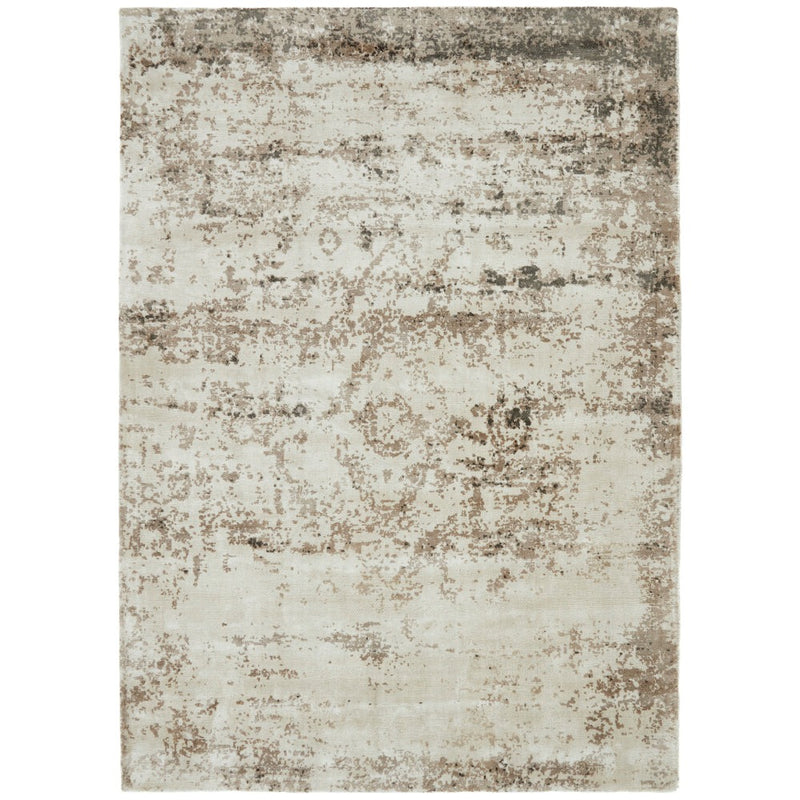 Persia Rug Mocha Cloud Rug made from 100% viscose, featuring a diamond pattern in the centre. 