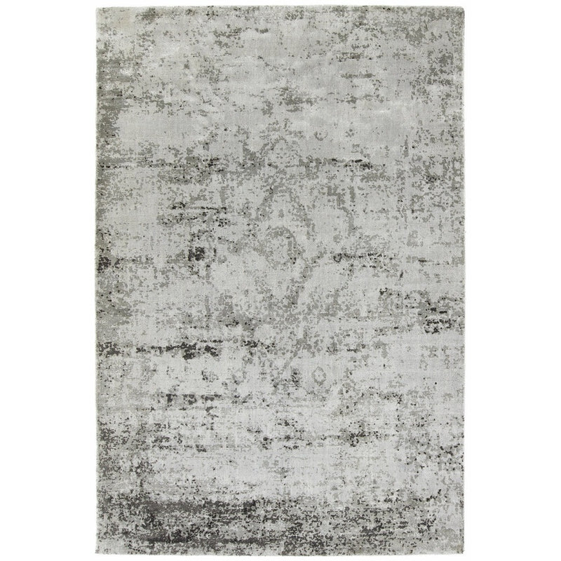 Persia Rug Fossil Cloud Rug made from 100% viscose, featuring a diamond pattern in the centre.