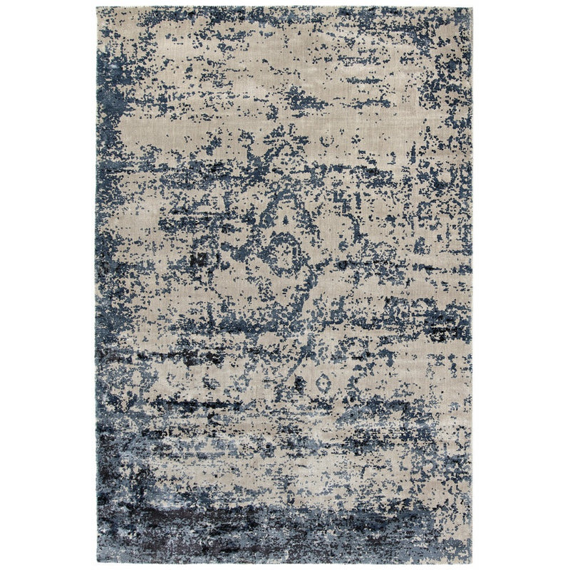 Persia Rug Midnight Oyster Rug made from 100% viscose, featuring a diamond pattern in the centre. 