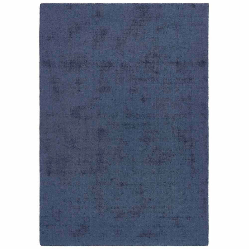 Reef Navy Rug made from 100% recycled materials in a solid dark blue colour.