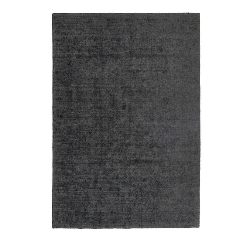 Reef Dark Grey Rug made from 100% recycled materials in a solid dark grey colour. 